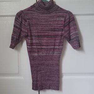 Purple, pink, black Turtleneck with 3/4 sleves.